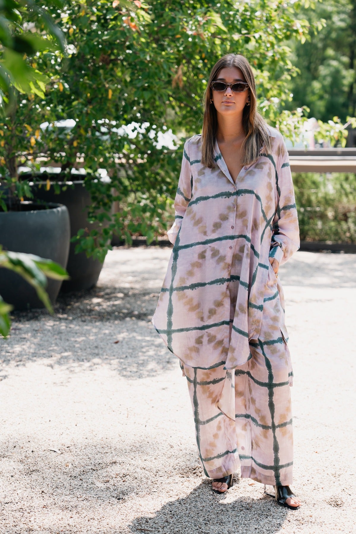 The Osiris pant and matching shirt by Mes Demoiselles Paris, worn outside the boutique at Red Hill