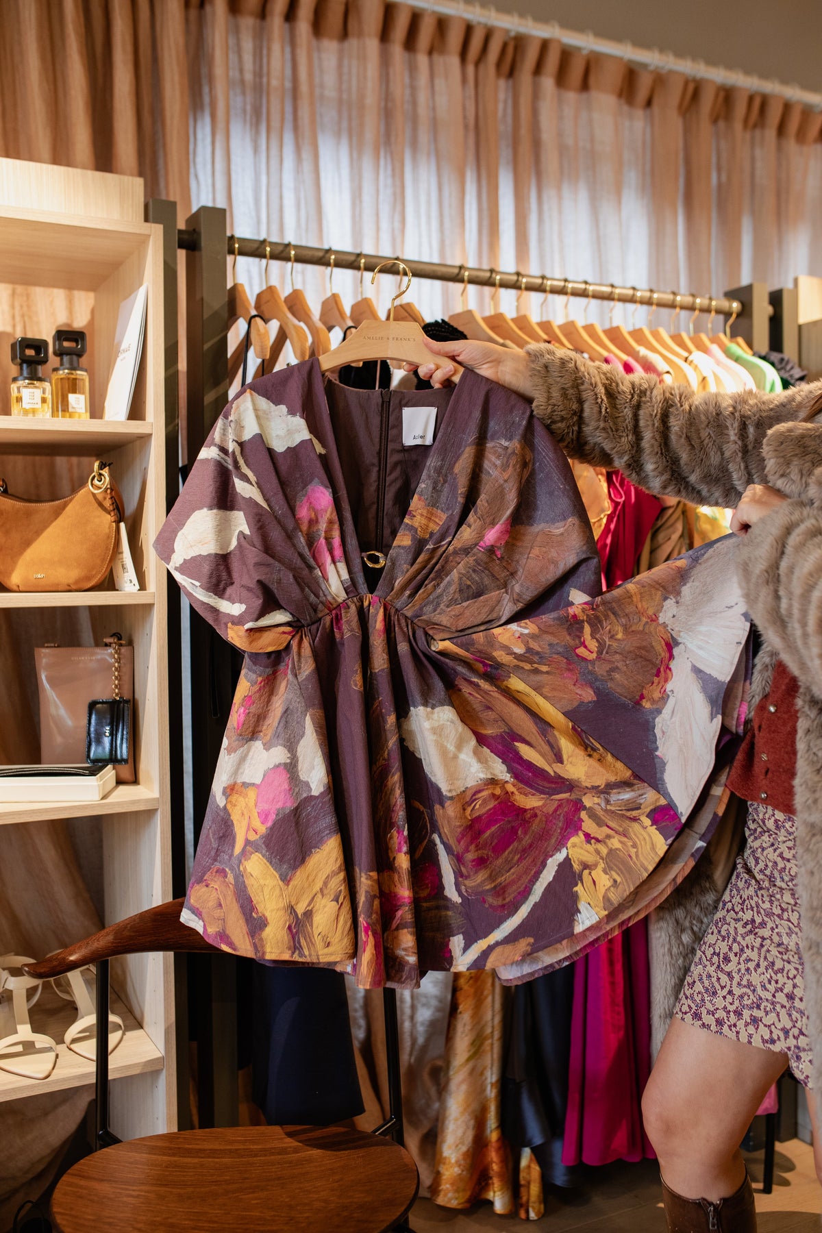 A rail of printed silk pieces newly arrived at the Amelie & Frank's boutique in Red Hill