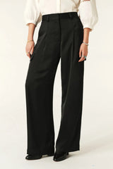 BA&SH Cary Trousers in noir, worn by model, cropped front view of wide leg