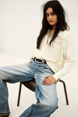 ba&sh Wilna Shirt in greige, worn by model, seated view