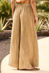 Back view showing the elasticated waist and the full sweep of the leg