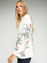 Vilagallo Hannah Linen Jacket in white with illustrated motifs, worn by model, angled view