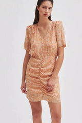 Second Female Mora Mini Dress in tigerlily print, ruched front, worn by model, front view