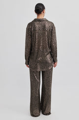 Second Female Moonshine Trousers in major brown sequin, worn by model, back view