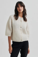 Second Female Andrea Knit Rib Cardigan in pumice stone, worn by model, front view