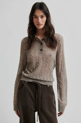 Second Female Vespa Knit Long Sleeve Polo in mid brown melange, worn by model, front view