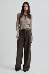 Second Female Vespa Knit Long Sleeve Polo in mid brown melange, worn by model, full length