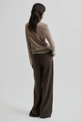 Second Female Vespa Knit Long Sleeve Polo in mid brown melange, worn by model, back view