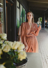 Sabina Musáyev Marble Dress, worn by model holding a glass outdoors