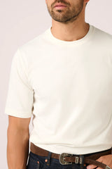Christian Kimber Apollo T-Shirt in off-white, close view of the crew neck and sleeve on figure