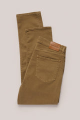Christian Kimber Rose Street Selvedge Jeans in camel, folded flat showing the back and leather patch