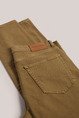 Christian Kimber Rose Street Selvedge Jeans in camel, close detail of the back pocket and leather patch