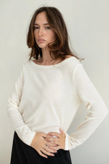 Vaenn Baby Wool Long Sleeve Wide Neck Crew in double cream, on figure, close view of the wide neckline