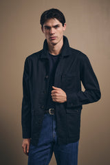 Midnight Fitzroy chore jacket worn buttoned with jeans