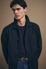 Midnight Fitzroy chore jacket over a dark T-shirt, three-quarter view