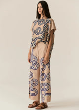 POL Alter Top in tan with navy swirl print, on figure, three-quarter view