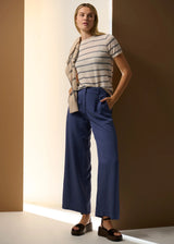 POL Sable Stripe Knit Tee in pebble and blue, on figure, front view with hand in pocket