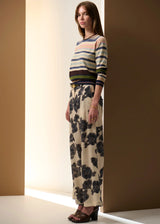 POL Amara Pant in cream with charcoal floral print, on figure, side view of the wide leg