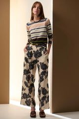 POL Amara Pant in cream with charcoal floral print, worn by model with a striped knit, front view