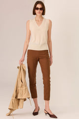 POL Orson Vest in ivory, V-neck knit worn by model with brown trousers, front view