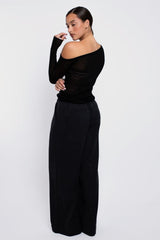 Vaenn Remsen One Shoulder Sheer Knit in black, on figure, back view