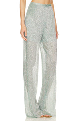 Sabina Musáyev Mark Pants in sage blue crinkle metallic, worn by model, side view