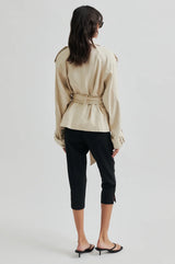 Second Female Estivo Linen Blend Jacket in beige, belted, worn by model, back view
