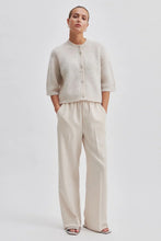 Second Female Andrea Knit Rib Cardigan in pumice stone, worn by model, full length front