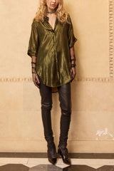 Full-length view of the Light shirt worn with black leggings and knee boots