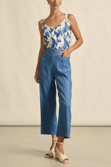 Zoe Kratzmann Memo Top in azure bouquet print, worn by model with blue trousers, full length