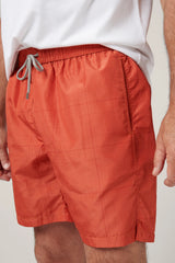 Christian Kimber Rose Bay Swim Shorts in orange, close detail of the drawcord waist and side pocket