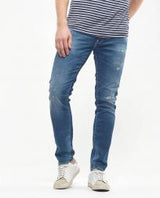 Le Temps des Cerises Jogga Slim Jeans in blue, worn by model, angled view