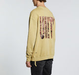 Ksubi Crowded Kash Crew in khaki, worn by model, three-quarter back view