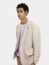 Scotch & Soda Pinstripe Linen Blazer in sand and white stripe, worn open over a lilac tee, front view