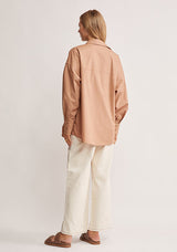 Mos The Label Wanderer Blouse in dusty clay, worn by model, back view