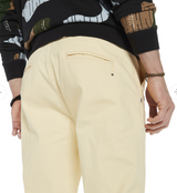 Scotch & Soda Stuart Slim Fit Chino in yellow, on figure, back view of the seat and welt pocket
