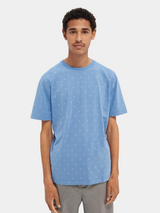 Scotch & Soda Classic Crewneck in cornflower blue with small all-over print, worn by model, front view