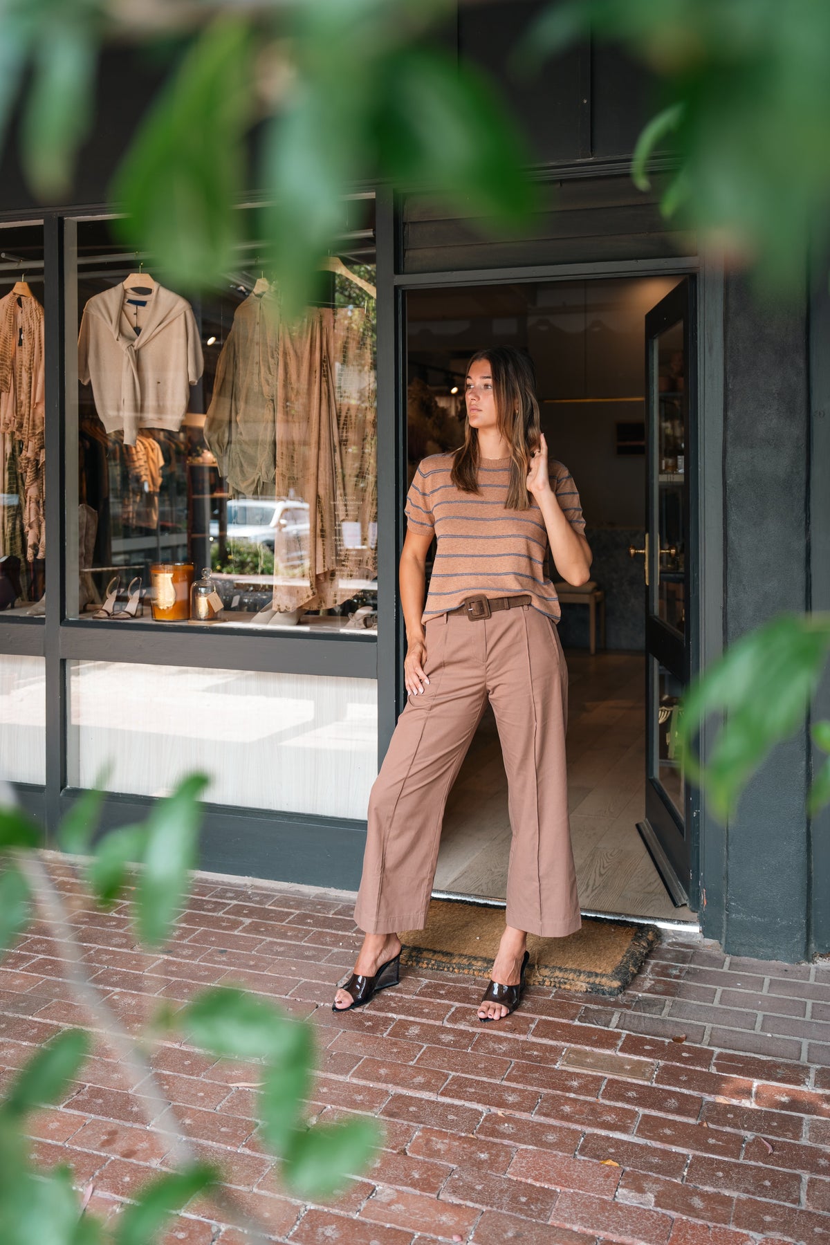 A POL set in blush and tan, worn in the doorway of the Amelie & Frank's boutique at Red Hill