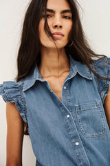ba&sh Yoyo Shirt in blue jeans, close view of the ruffled sleeves and chest pocket
