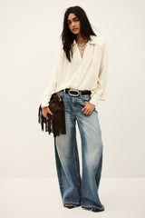 ba&sh Wilna Shirt in greige, worn by model with jeans, full length front view