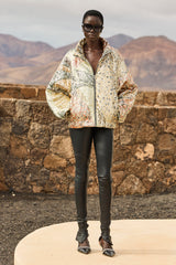 Mes Demoiselles Jerry quilted jacket worn with black leggings, full length
