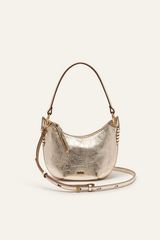 ba&sh Swing Bag in gold metallic with crossbody strap, studio view