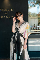 Mes Demoiselles Micasso Dress, black and ivory brushstroke print, worn by model outside the boutique