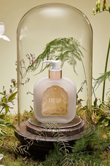 Santa Maria Novella Fresia Fluid Body Cream in a styled still life