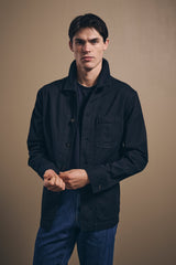 Midnight Fitzroy chore jacket worn with jeans, front view