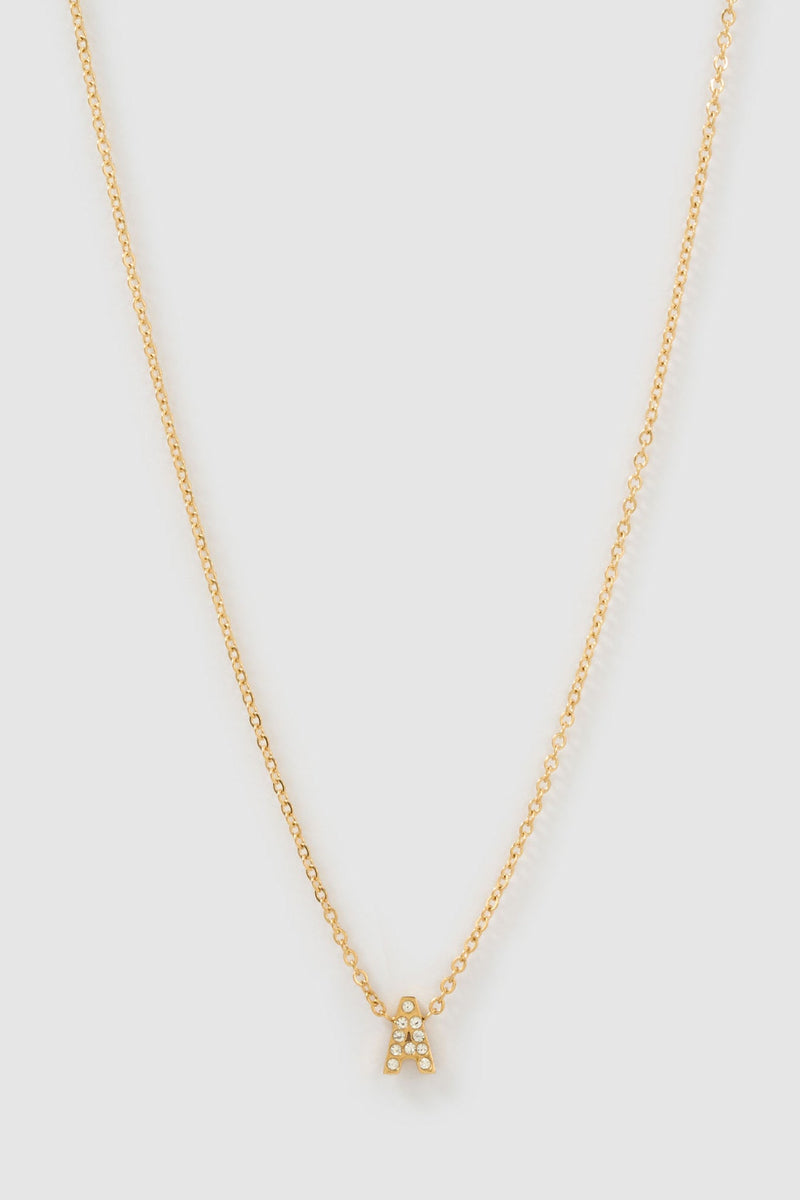 Arms of Eve Mini Initial Stone Necklace in gold, zircon initial pendant on chain, front packshot
