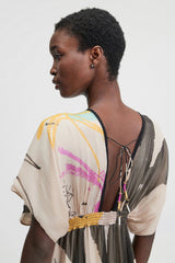 Mes Demoiselles Micasso Dress, worn by model, close view of the open back and beaded waistband