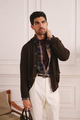 Bronte linen check shirt under a dark jacket, three-quarter view