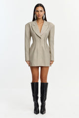 Acler Jared blazer worn with a mini skirt and black boots, front view