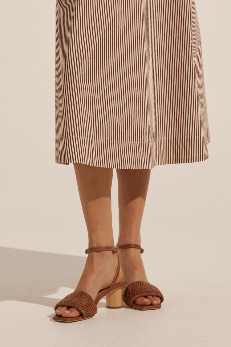 Zoe Kratzmann Stint Heel in canyon woven leather, worn on figure with a striped skirt